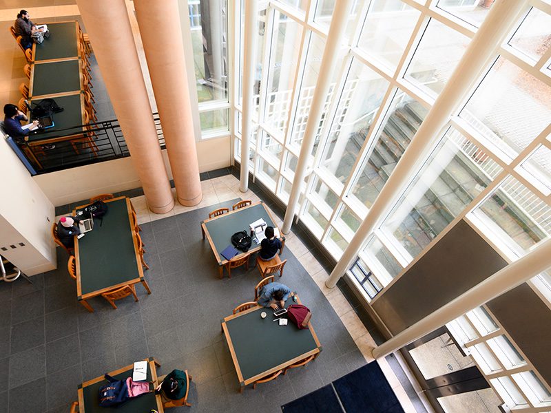 overhead photo of students studying at tables in Shields Library