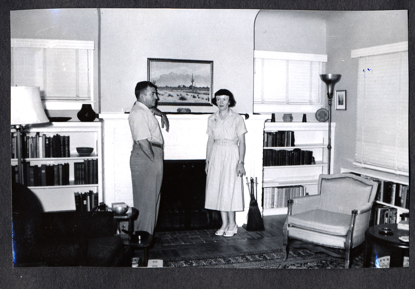 Michael and Margaret standing by fireplace