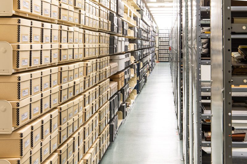 Boxes of archives on shelves