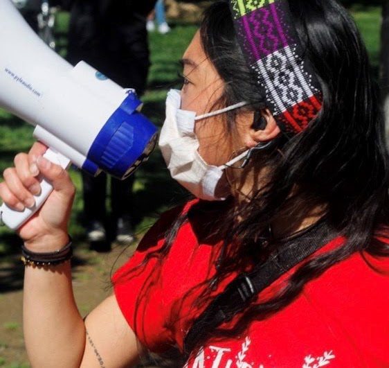 Student speaking into a megaphone