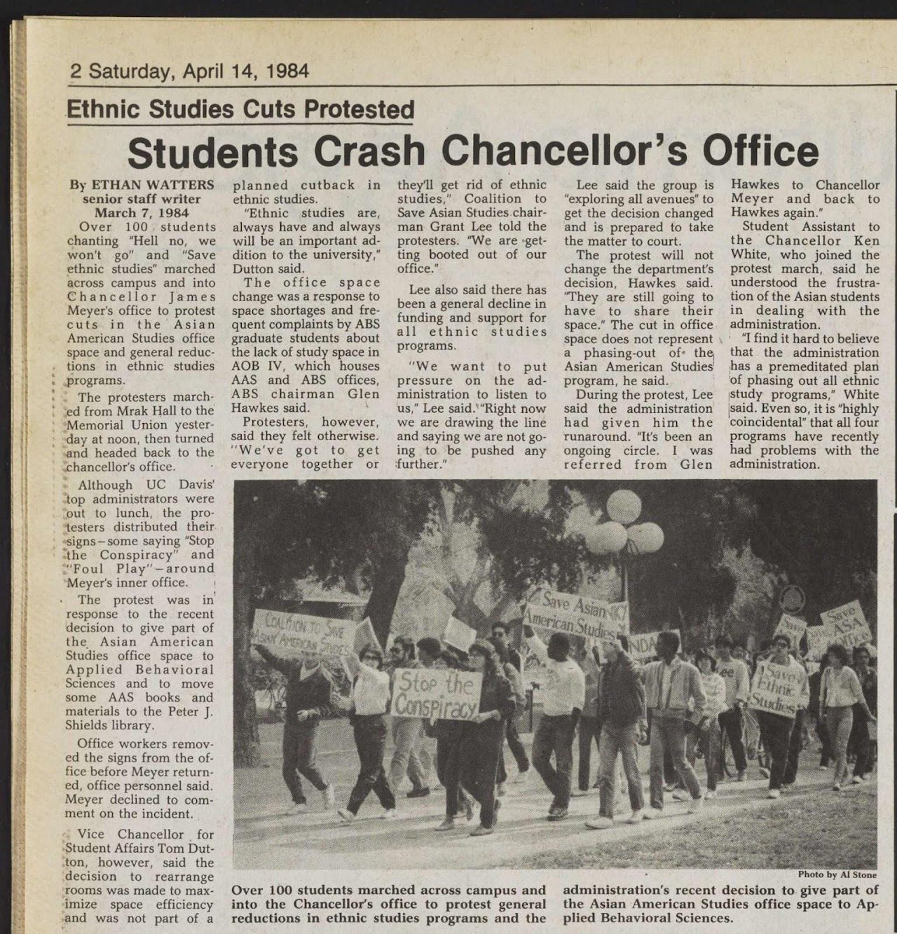 Newspaper article from the California Aggie reporting a student march on the Chancellor's office, includes image of students marching. 