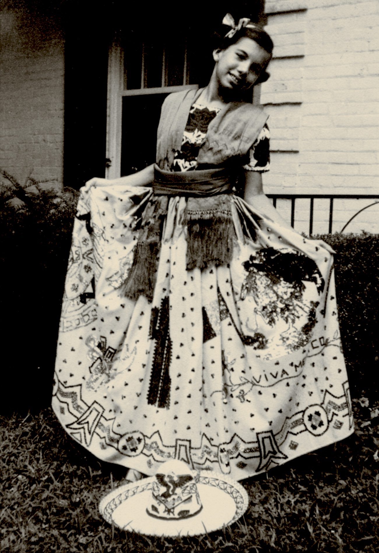 Betita Martinez, age 12, in traditional Mexican China Poblana