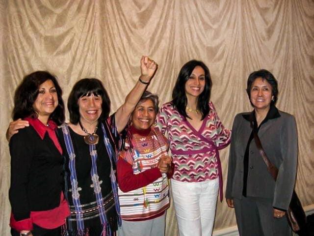 Betita Martinez, second from the left, smiles with a group of Latina women at the National Association of Chicana and Chicano Studies Plenary in 2007