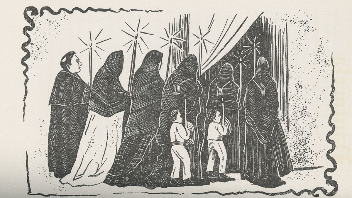 A procession of people and their children holding lights.