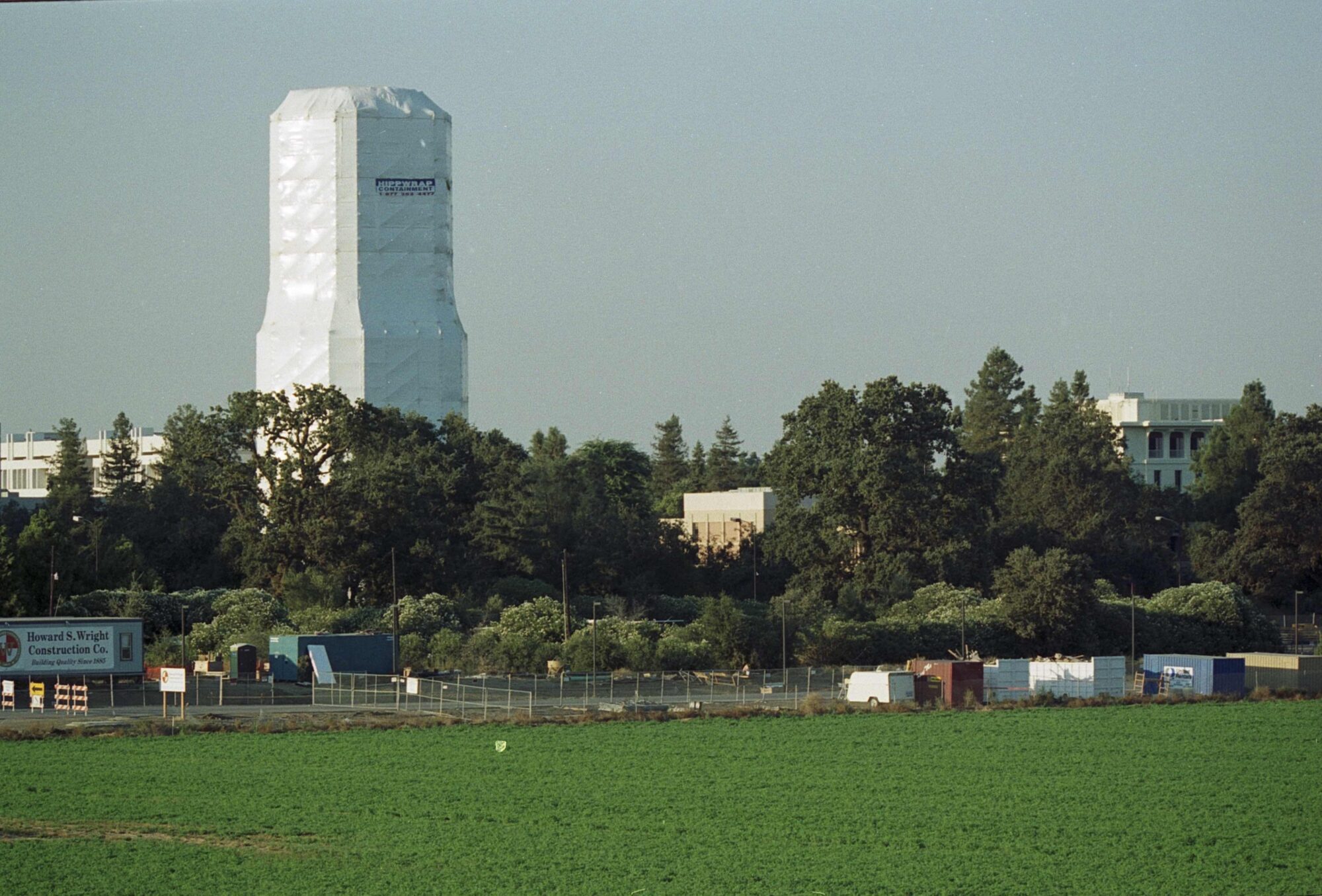 Photograph of water tower under white covering for renovation 