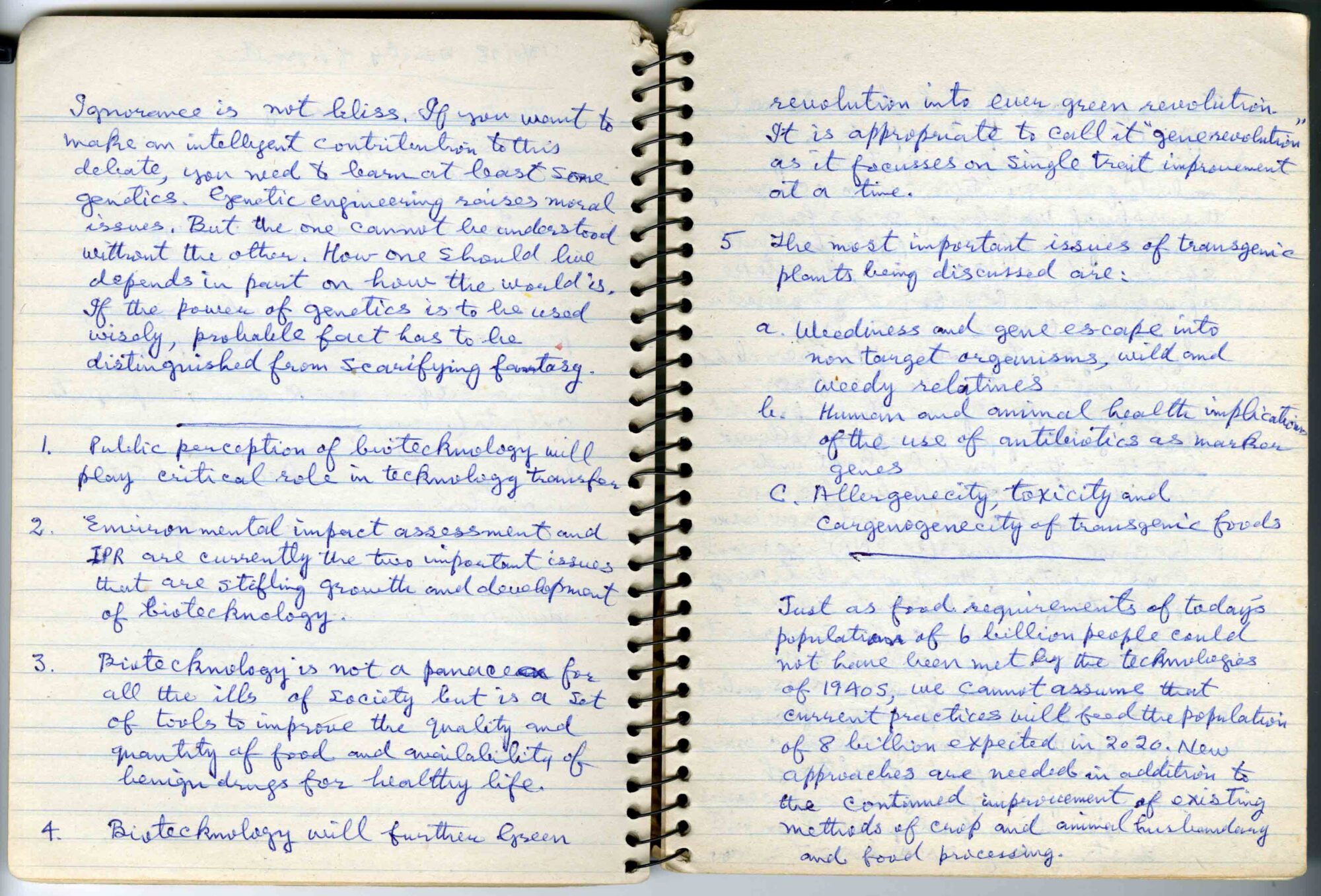 Image of two pages of a handwritten entry in a spiral bound notebook