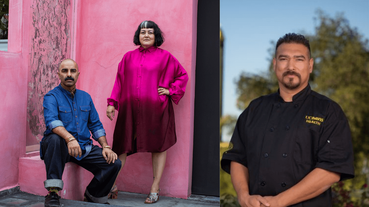 Against a hot pink background, a person seated, wearing a denim shirt and cuffed jeans next to a person standing wearing a hot pink blouse and black skirt. A person wearing a black shirt with UC Davis Health logo stands to far right.
