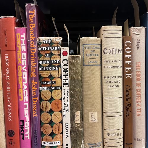 A row of books about coffee and tea